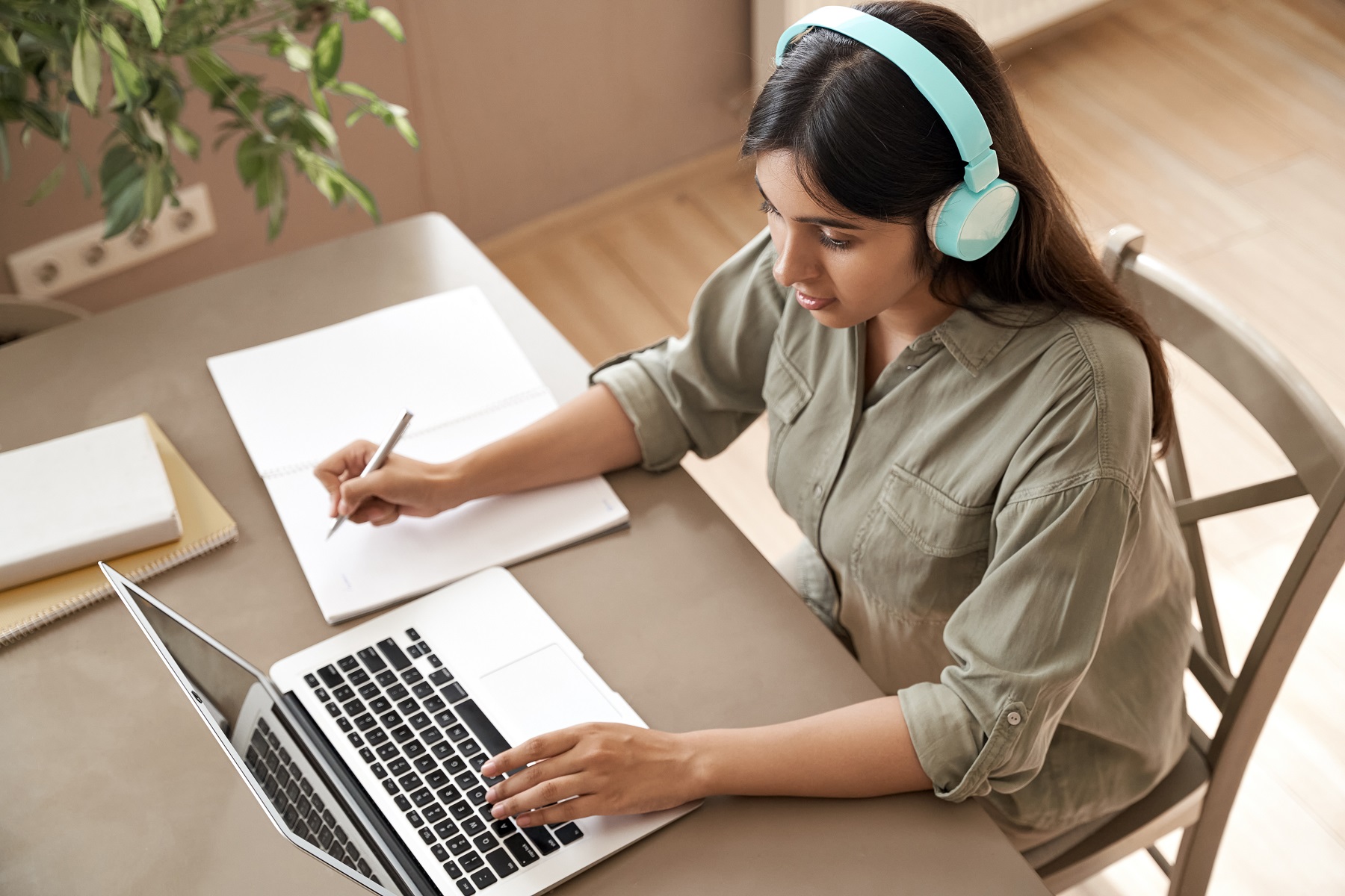 Female student working at laptop