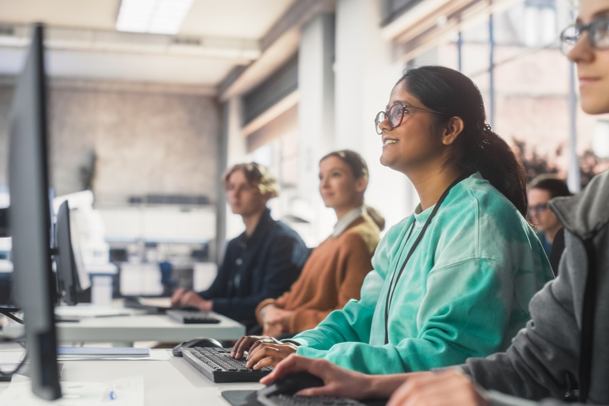 A rwo of students working at screen